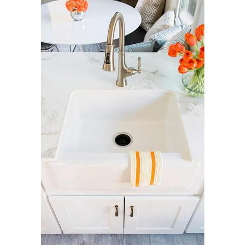 Touchless Single-Handle Pull-Down Kitchen Faucet With LED Light, Soap Dispenser, Hands-Free Sensor Sprayer In Stainless Steel installed over white sink