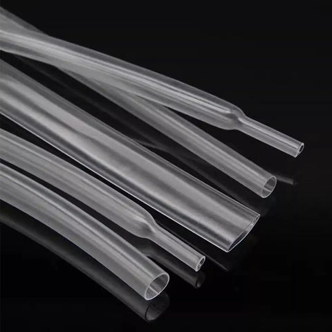 Close-up of 100Pcs 6 Size Clear PE Heat Shrink Tubing Kit For Electrical Insulation And Repairs DIY Friendly Waterproof Durable Cable Wrap Sleeves.