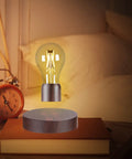 Levitating Light Bulb With Magnetic Levitation And Touch Control Floating Rotating LED Desk Lamp on nightstand by bed