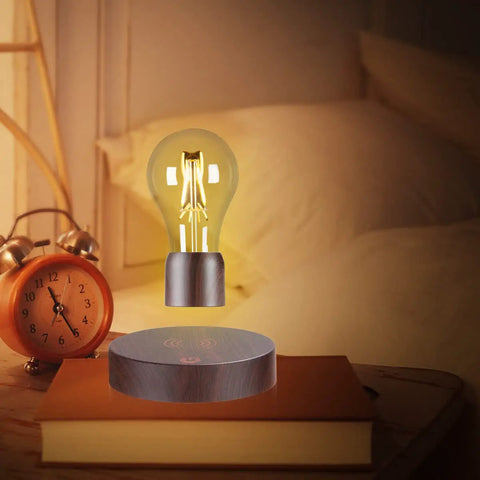 Levitating Light Bulb With Magnetic Levitation And Touch Control Floating Rotating LED Desk Lamp on nightstand by bed