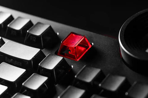 Red keycap on a 98 Key Silent Mechanical Keyboard With Hot Swappable RGB Lighting And Tri Mode Wireless Setup.