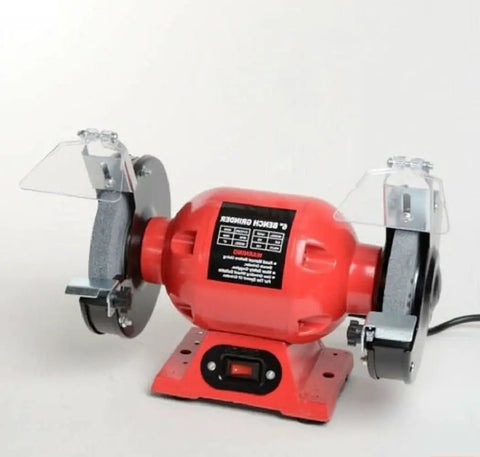Professional Grade Knuckle Busting 1/2 HP 6 Inch Bench Grinder, red with clear safety shields, for metal sharpening.