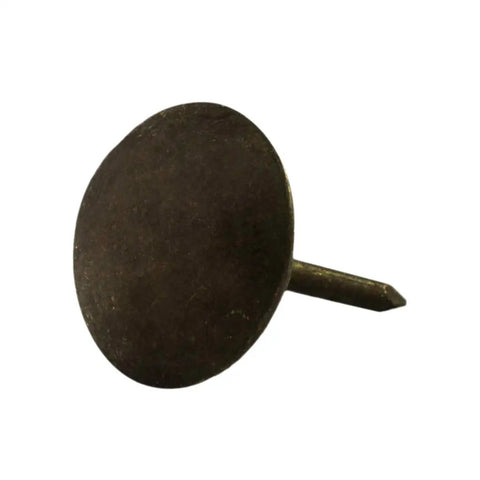 Close-up of a dark antique brass upholstery tack with 7/16 in head diameter and 1/2 in shank, part of 100 Pack Dark Antique Brass Upholstery Tacks For Chairs And Headboards, 7/16 Inch Head Diameter, 1/2 Inch Shank, Heavy Duty Decorative Furniture Nails For DIY Projects And Home Decor.