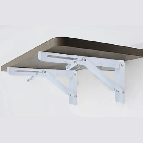 Rock Solid White Folding Shelf Brackets Built Like A Truck Wall Mounted supports a brown shelf, heavy duty steel, measures 8x7 inches.