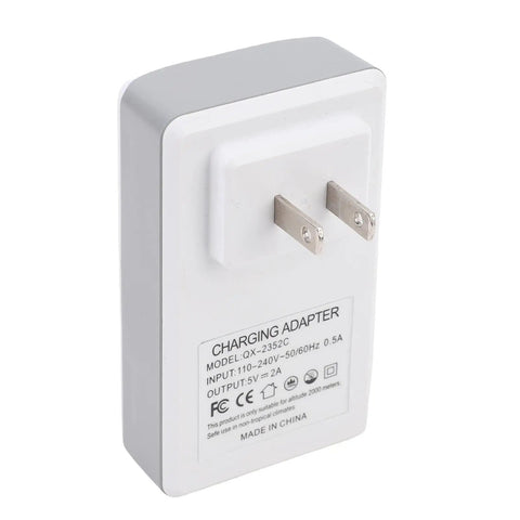Rock Solid UPS Power Supply Plug And Play 2600 mAh Battery Backup Emergency System adapter with two metal prongs, compact and white.