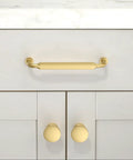 10 Pack Brushed Gold Round Cabinet Knobs 1-1/5 Inch 30mm Single Hole Drawer Pulls installed on kitchen cabinet