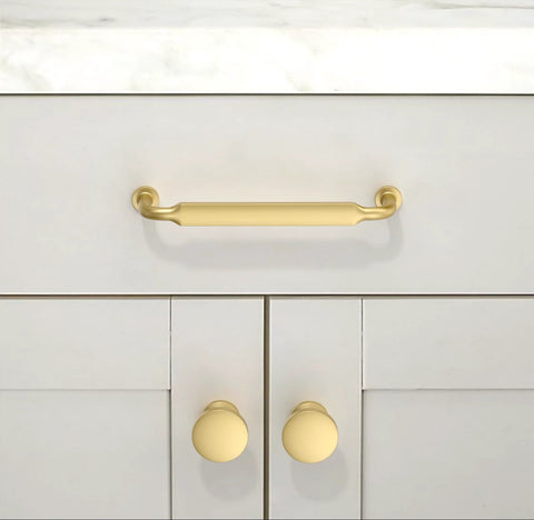 10 Pack Brushed Gold Round Cabinet Knobs 1-1/5 Inch 30mm Single Hole Drawer Pulls installed on kitchen cabinet