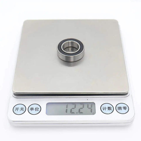 15x26x7mm Ball Bearing Set For Bicycle Rear Hubs Chrome Steel on digital scale