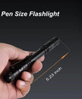 Person holding Pocket Size LED Pen Light Flashlight 10 Pack Q5 LED Mini Clip Lights Ultra Bright For EDC Camping And DIY Portable Pen Torch