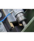 Close-up of Super Lightweight Portable Magnetic Drill Press By CS Unitec MAB 100 K showing quick change Weldon chuck in action.