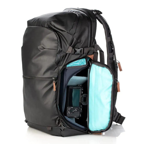 Explore V2 30 Starter Kit Camera Backpack For Travel And Outdoor Adventures, open side showing core unit and medium mirrorless camera.