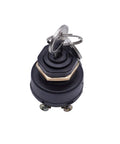 Black ignition switch with two metal keys on top, showing hex nut and mounting screws, isolated on white background.