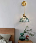 Battery Powered Wall Sconce Set Of 2 With Remote No Wiring Needed Wireless Indoor Lights Featuring Dope Blue Glass Shade Vintage Vibe Style Hanging Wall Lighting Fixture For Bedroom Living Room Bathroom Hallway And More Decor mounted above a bed