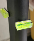 Top Tier 5 Piece Set Of Mini Magnetic Bubble Levels Your Go To Pocket Spirit Squares With Rock Strong Adhesion attached to steel post.