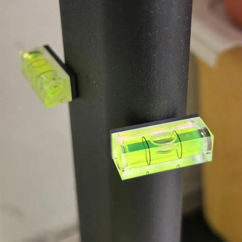Top Tier 5 Piece Set Of Mini Magnetic Bubble Levels Your Go To Pocket Spirit Squares With Rock Strong Adhesion attached to steel post.