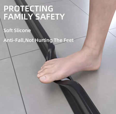 98 Inch Collapsible Shower Water Dam Barrier Stopper for Wet Dry Separation being stepped on to show its collapsible silicone design.