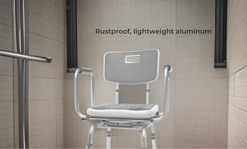 360 Degree Swivel Shower Chair With Back Support, adjustable height, in aluminum; cushy arm rests visible in a shower setting