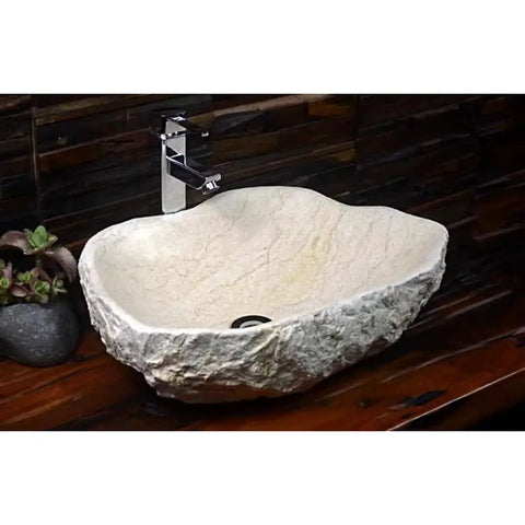 Top Shelf Stone Vessel Bathroom Sink Ideal For Countertops Or Patios Featuring A Slick Smooth Bowl Interior And Rugged Outside Look That Is A Serious Space Upgrader, shown from the side with faucet.