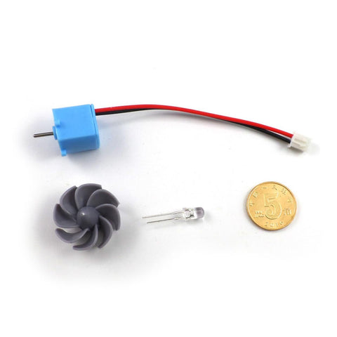 Portable Mini Wind And Hydro Generator Dual Powered Educational Kit parts, including plastic turbine, wires, and small components.
