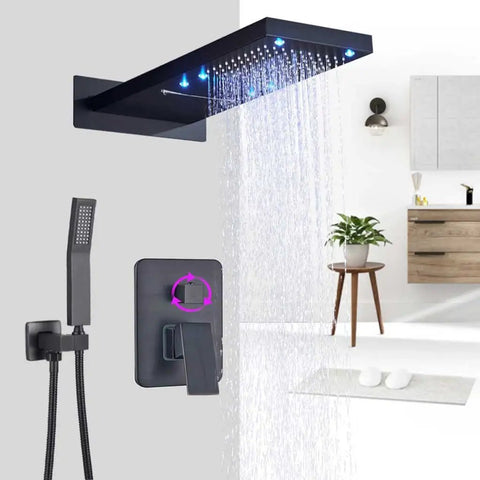 Slick Matte Black Shower System Featuring Rectangle LED Rainfall Head Wall Mount Bathroom Faucet Hardware Kit With Three Way Diverter And Dynamic Color Lights For Top Tier Home Spa Chill with water cascading down.