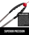 Heavy Duty Stainless Steel Kitchen Tongs Set Of 2 With Heat Resistant Silicone Tips holding a cherry, showcasing scalloped edges.