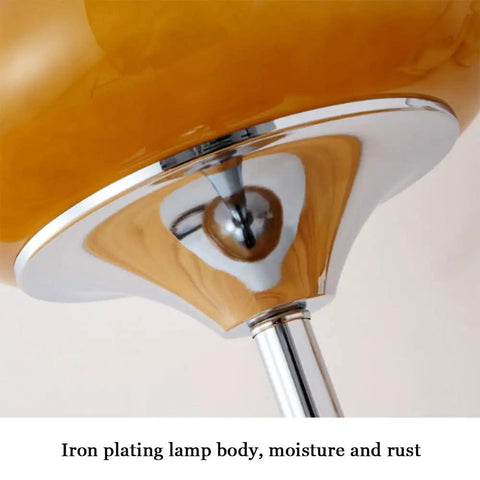 Close-up of Egg Tart Desk Lamp With Cozy Warm Glow Nordic Style Japanese Table Lamp Creamy White Lampshade And Iron Base Eye Protection