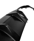 Close-up view of unpainted black ABS plastic rear bumper diffuser for 2012-2014 Mercedes C-Class C204 W204 coupe and sedan aero add on