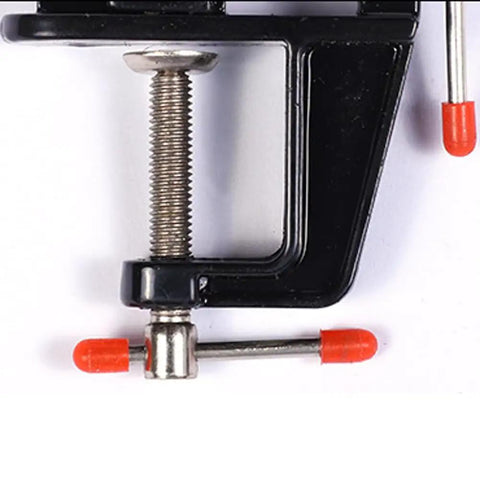 Close-up of a Compact Mini Vise Clamp With A Rock Solid Hold for woodworking tasks, featuring a black finish and durable screw.
