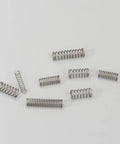 Get Your Hands On This Awesome 300PCS Stainless Steel Compression Spring Assortment Kit With 23 Varied Sizes Perfect for Mechanical Repair Electronic DIY Projects And Car Gadgets To Fix Doors Umbrellas Piano Keys And Kitchenware Like A Boss Today, assorted steel springs on white