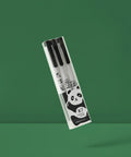 Three Panda Pattern Gel Ink Pens Set With All Black Ink 0.5mm Fine Point Comfortable Soft Grip ABS Pens package on green background.