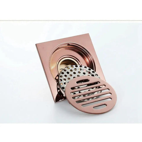 Solid Rose Gold Bathtub Stopper With Heavy Duty Brass Body And Reliable Anti Odor Seal For Showers And Floors, overhead view of drain