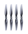 4 black two-blade propellers for RC drones shown vertically, 7x4.5 2 Blade Polycarbonate Propeller Set Of 4 For RC Drones, Ultra Lightweight