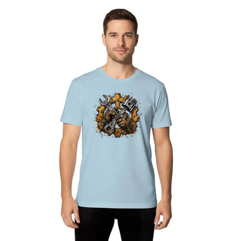 Rugged Garage Project T-Shirt With Vintage Piston Wrench And Gear Badge Design For Hardcore DIY Builds, Engine Repair Work, And Weekend Shop Creations Featuring Distressed Vector Graphics On Mens Heavyweight Cotton in light blue worn by a man.