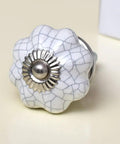 Fresh Look 100 Pack White Ceramic Crackle Pumpkin Drawer Knobs For Kitchen Cabinets And Dressers featuring a detailed silver center.