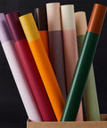 20 Sheets Flower Wrapping Paper Pack With 22 Inch Double Color Floral Bouquet Paper displaying colorful rolls in a box.