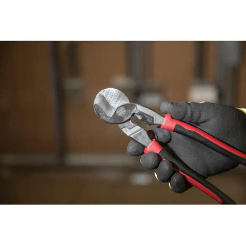 Pro Grade Journeyman High Leverage Cable Cutter And Wire Stripper For Aluminum Copper And Communications Cable held in gloves