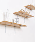 Heavy Duty White L Bracket Wall Mount Shelf Supports 2 Pack Cold Rolled Steel Angle Brackets supporting wooden shelves.