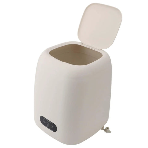 Game Changing 9L Portable Washing Machine With Spin Dryer And Clever Hidden Drain Hose, compact white washer with lid.