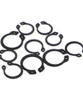 Heavy Duty Carbon Steel Circlip Retaining Rings For Shaft M6 To M50, assorted sizes, black, for securing mechanical parts.