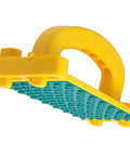 Yellow GRR-RIP-BLOCK smart push block with green gripping surface for routers, jointers, band saws, and table saws, angled view.