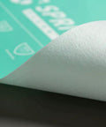 Close-up of Top Notch Temporary Floor Protection Roll For Construction And Home Reno Green Non Adhesive Surface Shield Film