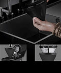 Barista Style Home Coffee Maker With Seven Cup Capacity And Timer Function Boil Dry Protection 680 Watts Reusable Washable Permanent Filter Easy To Clean Black being washed in a sink with water.