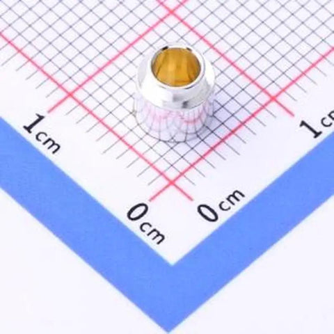 Twenty Top Shelf Smd Surface Mount Round Nut Columns For Printed Circuit Boards 3Point2X4Mm Tinned Copper Heavy Duty electronic assembly hardware on ruler.