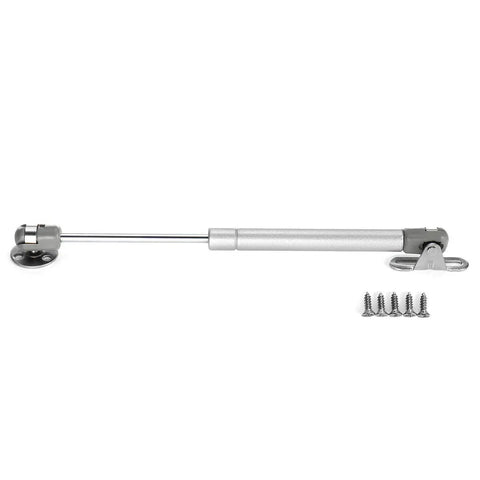 Heavy Duty 10 Inch Gas Spring Strut Lift Support With Brass Cover And Fixing Plate For Cabinet Doors Keeps Box Lids Open Smooth As Butter 60N Silent Glide No Slam Shut Hardware with screws visible.