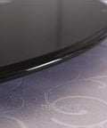 Top Shelf Black Tempered Glass Lazy Susan Turntable 90cm Round Rotating Dining Tray showing smooth edge detail on a stylish surface.