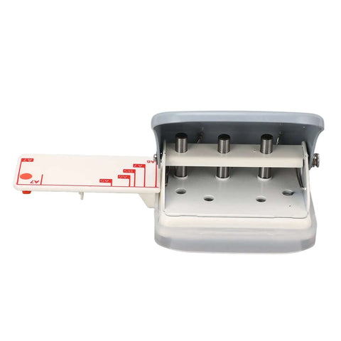 Portable 3 Hole Punch For Scrapbooks And Crafts, gray handheld paper punch with adjustable hole pattern and integrated ruler, front view