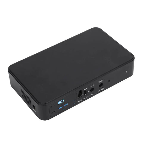 Legit 18000mAh Uninterrupted Power Supply With Usb Battery Backup For Routers And Security Cameras, black compact UPS unit.