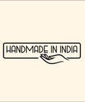 "Handmade in India" text with outline of a hand, minimalist design.