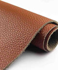 Rock Solid Wide Flat Leather Straps, Knockout Full Grain Cowhide Hide Sheet In Warm Brown Red, 39 By 39 Inches showcasing textured litchi grain.