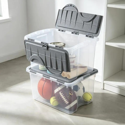Top Shelf 2 Pack Of 48 Quart Stackable Storage Bins With Clear Plastic Flip Hinge Lids And Gray Finish For Plenty Of Room To Keep Your Setup Tight And Your Life On Track, filled with sports equipment.